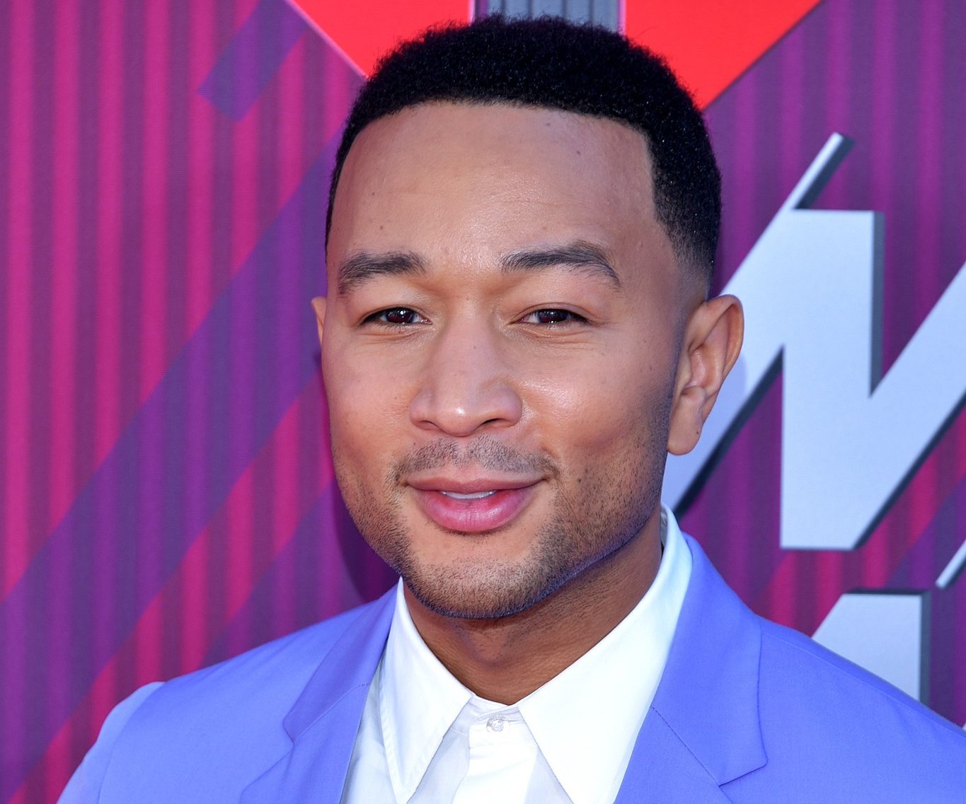 Portrait Photo of John Legend attending the iHeartRadio Music Awards