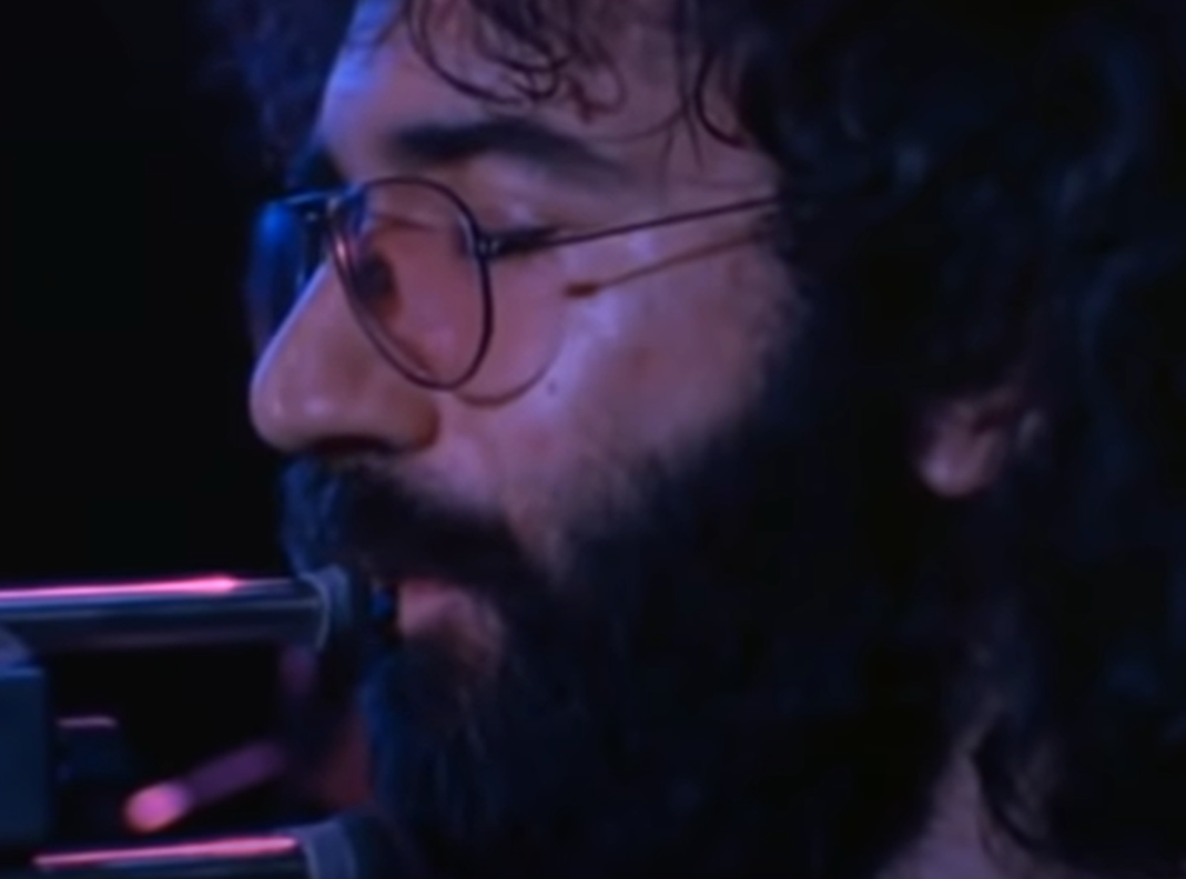 Screenshot of Jerry Garcia on stage - from The Grateful Dead (1977)