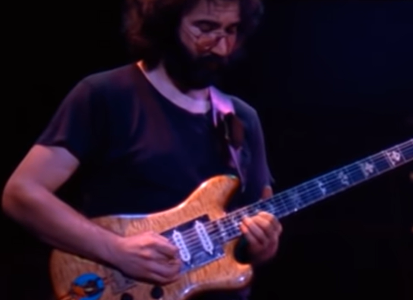 Screenshot of Jerry Garcia on stage - from The Grateful Dead (1977)