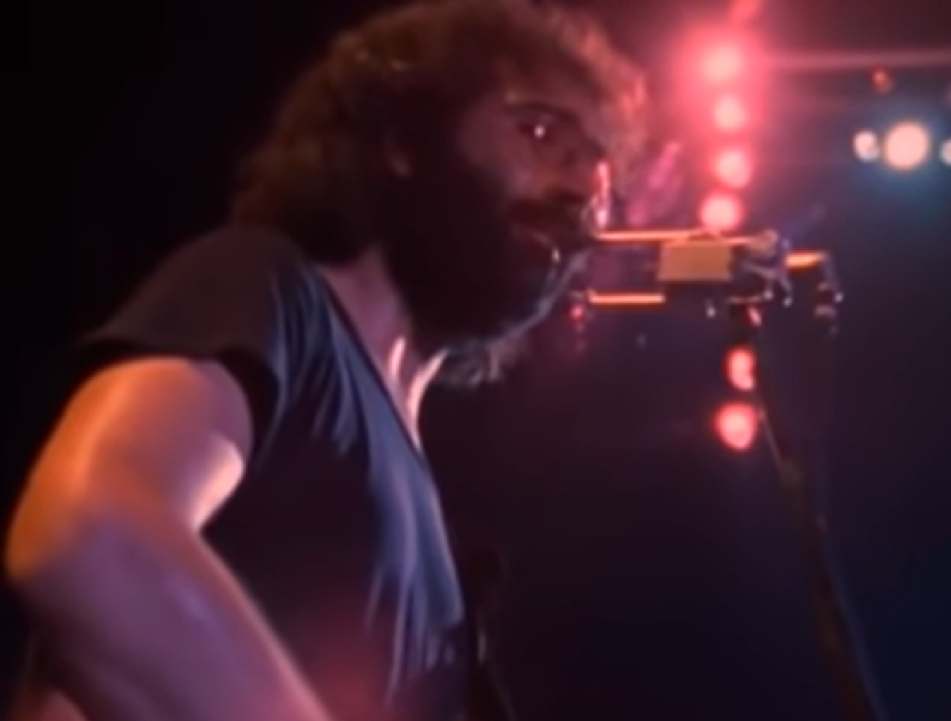 Screenshot of Jerry Garcia on stage - from The Grateful Dead (1977)