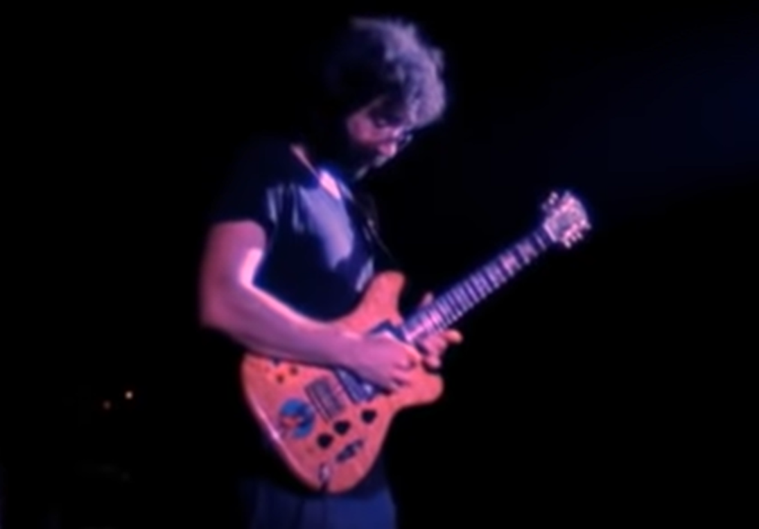 Screenshot of Jerry Garcia on stage - from The Grateful Dead (1977)