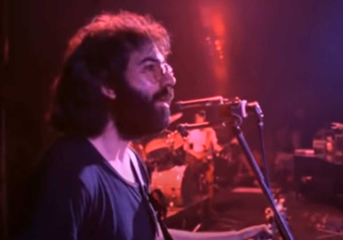 Screenshot of Jerry Garcia on stage - from The Grateful Dead (1977)