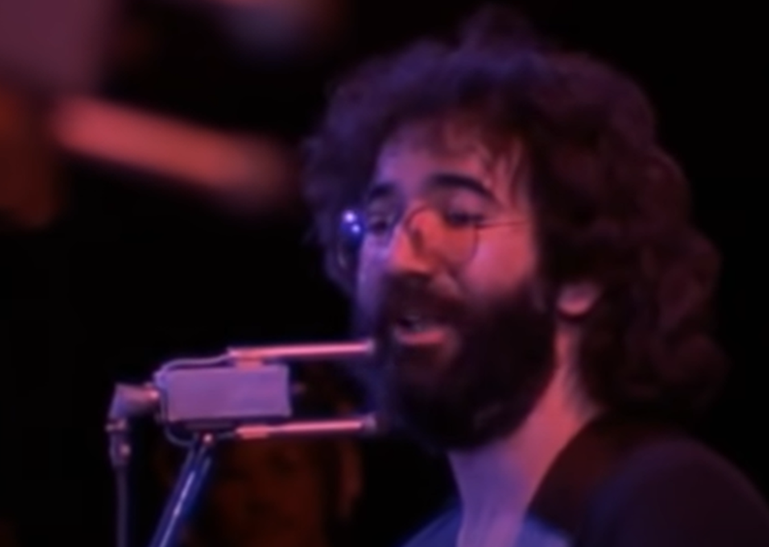 Screenshot of Jerry Garcia on stage - from The Grateful Dead (1977)