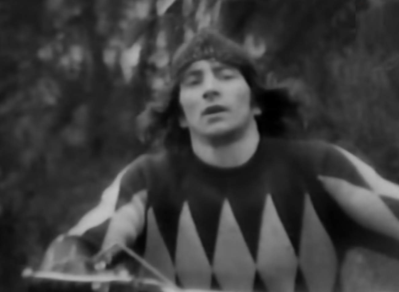 Screenshot of Bonn Scott riding a bike from - On The Brink (2022)