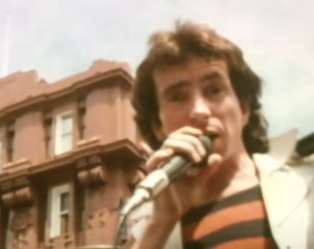 Screenshot of Bonn Scott singing from - On The Brink (2022)