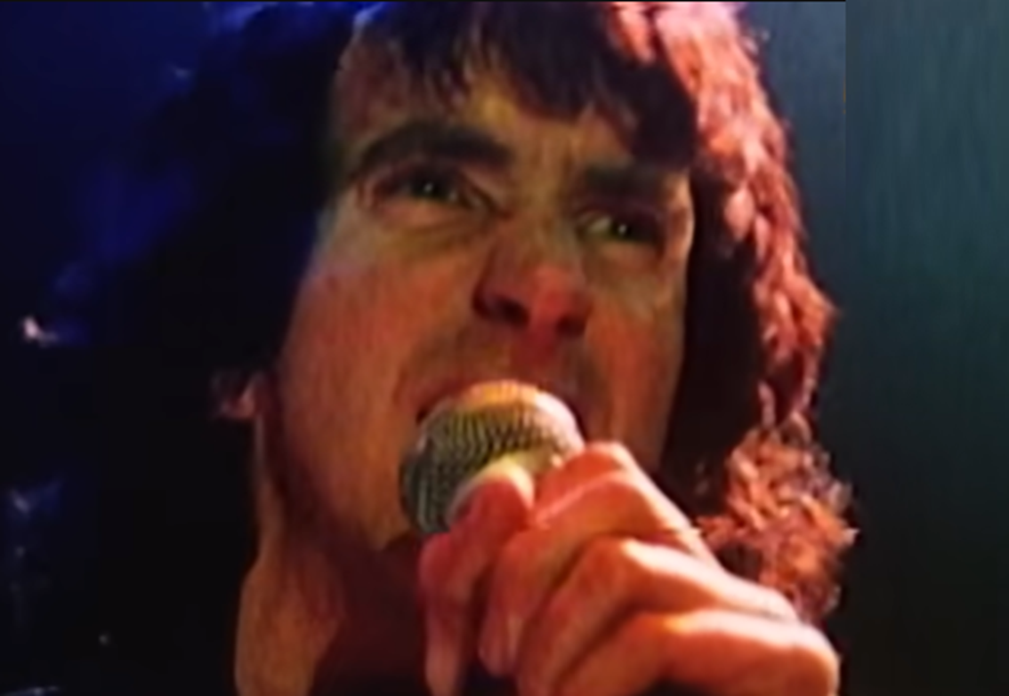 Screenshot of Bonn Scott singing from - On The Brink (2022)