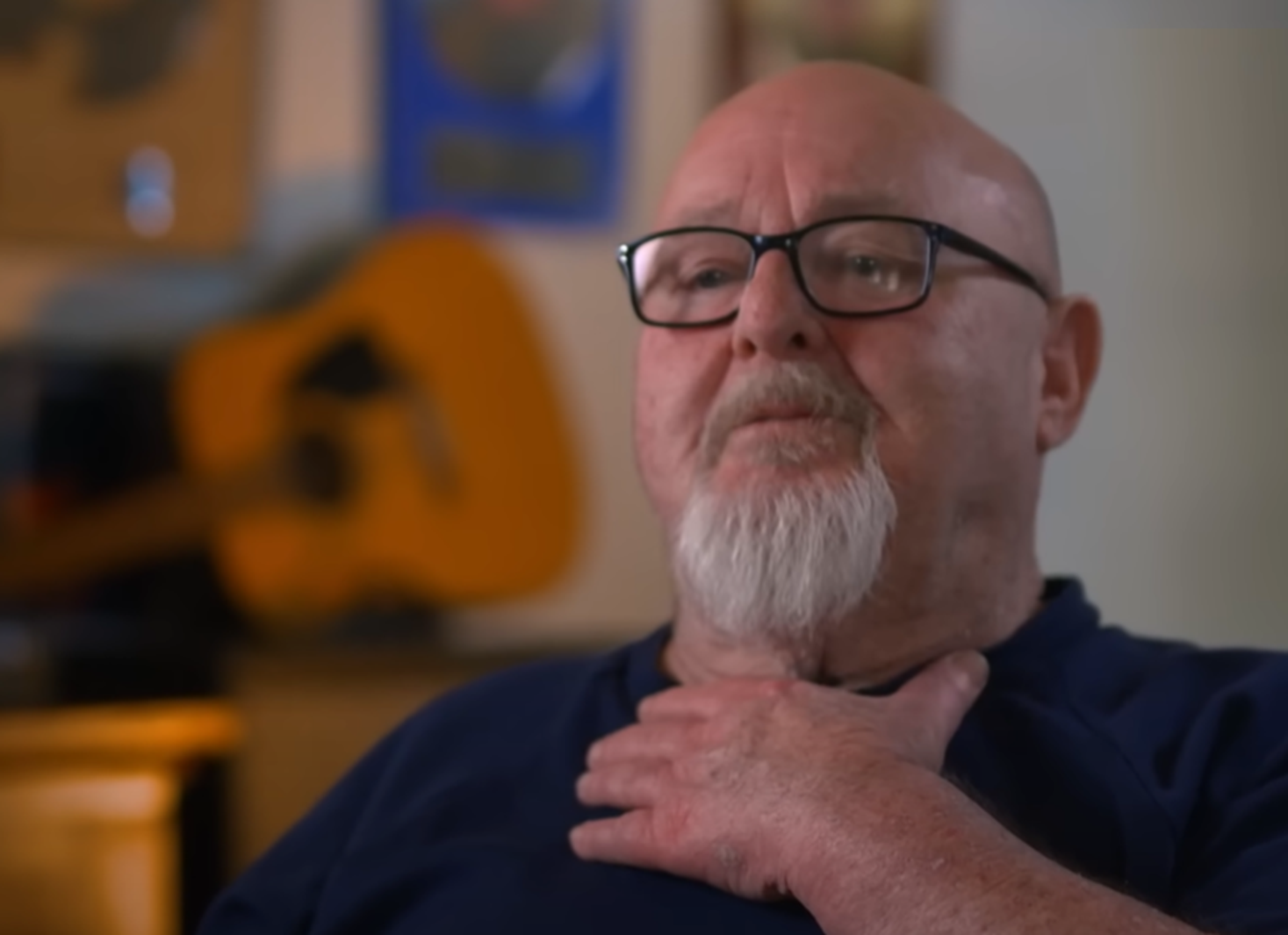 Screenshot of Bruce Howe talking at camera from - On The Brink (2022)