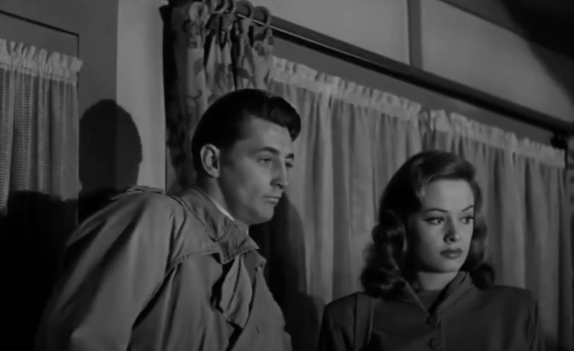 Robert Mitchum and Jane Greer in a scene in the movie 'Out of the Past'