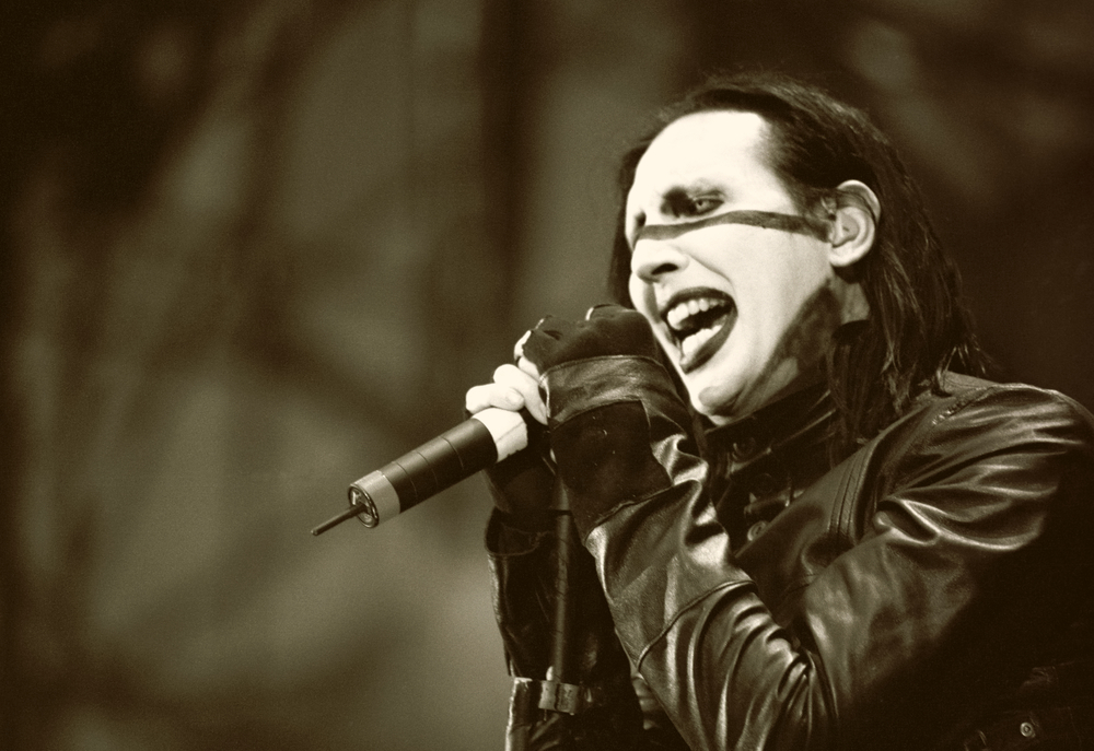 Performer Marilyn Manson entertains live in concert June 22, 2001 at Mile High Stadium in Denver, CO.