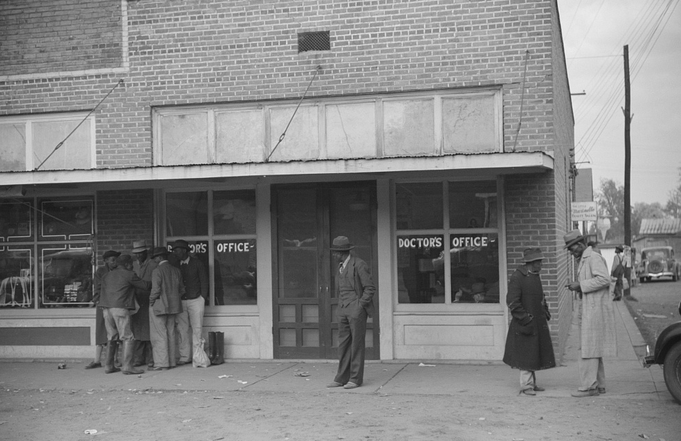 People in front of a Doctor's office