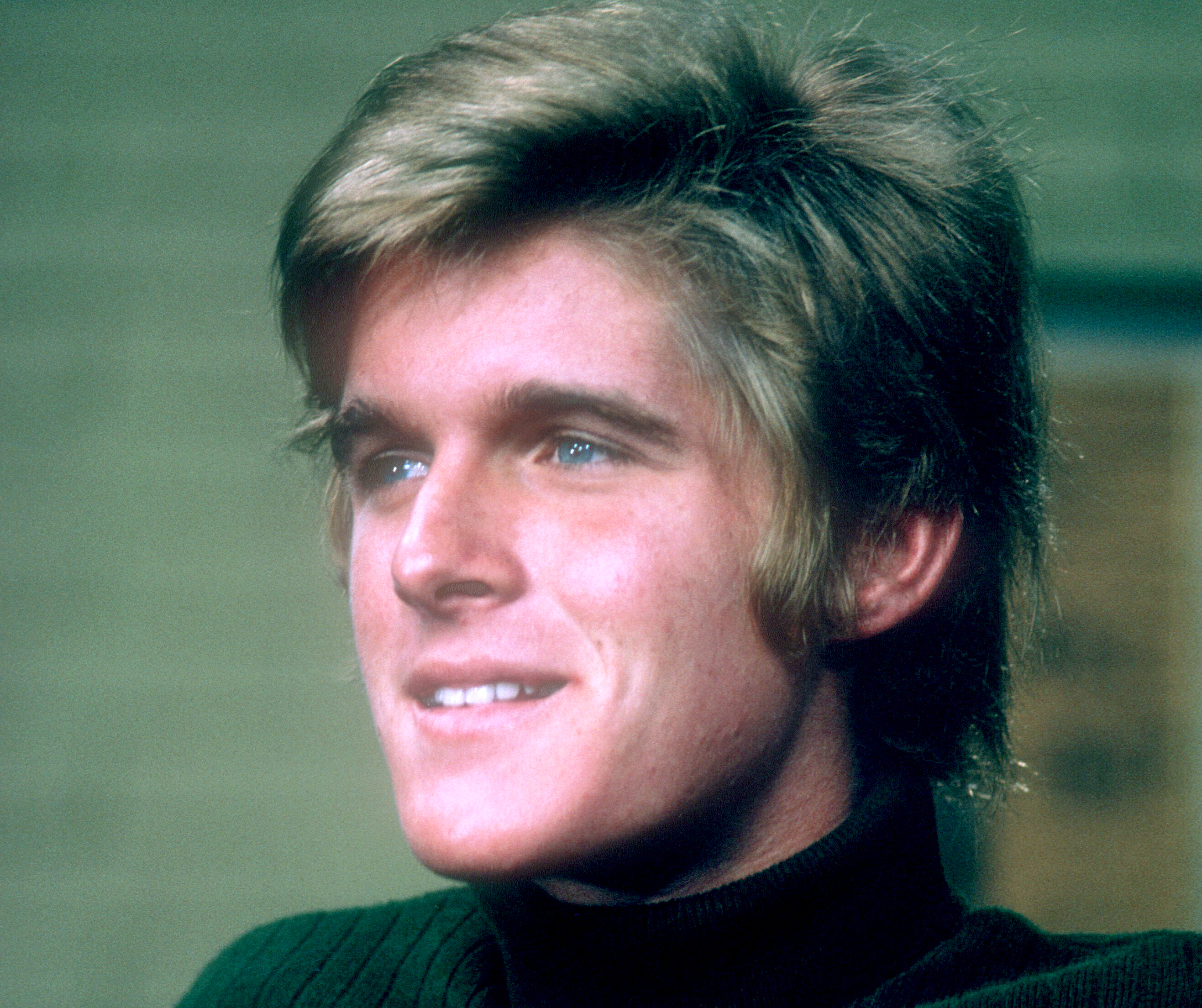 Dean Paul Martin in green turtleneck