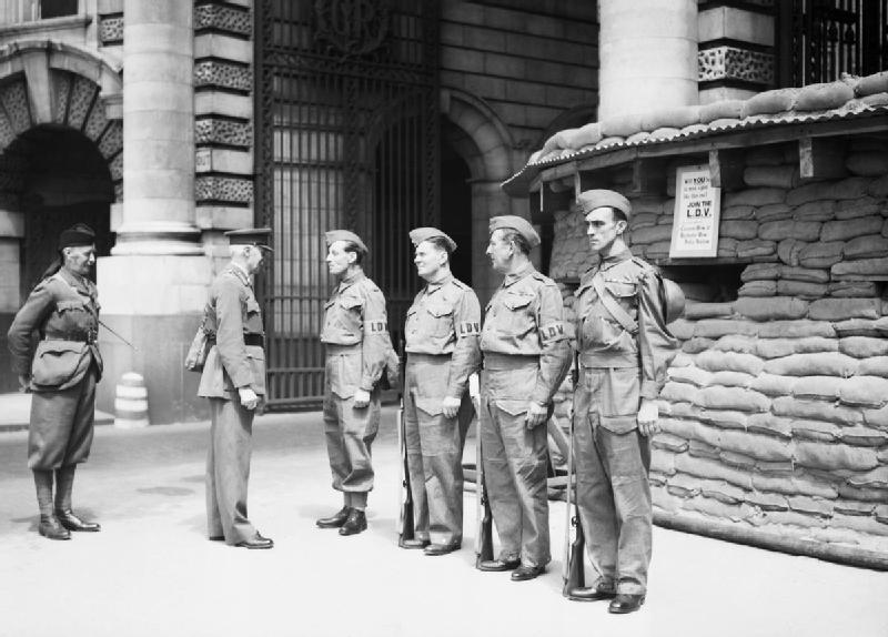 British soldiers from WW2 in London inspecting people