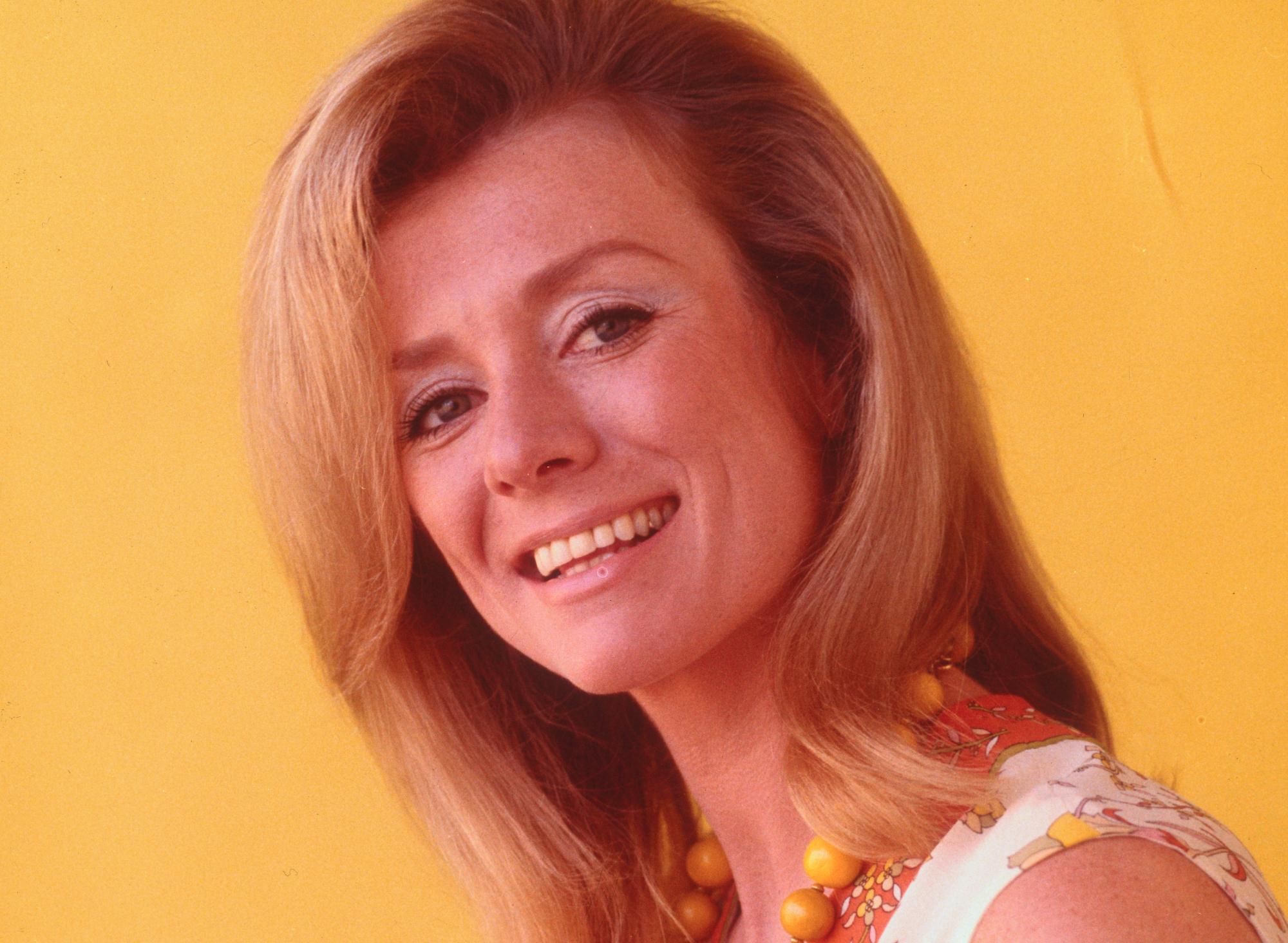 Inger Stevens in colorful dress