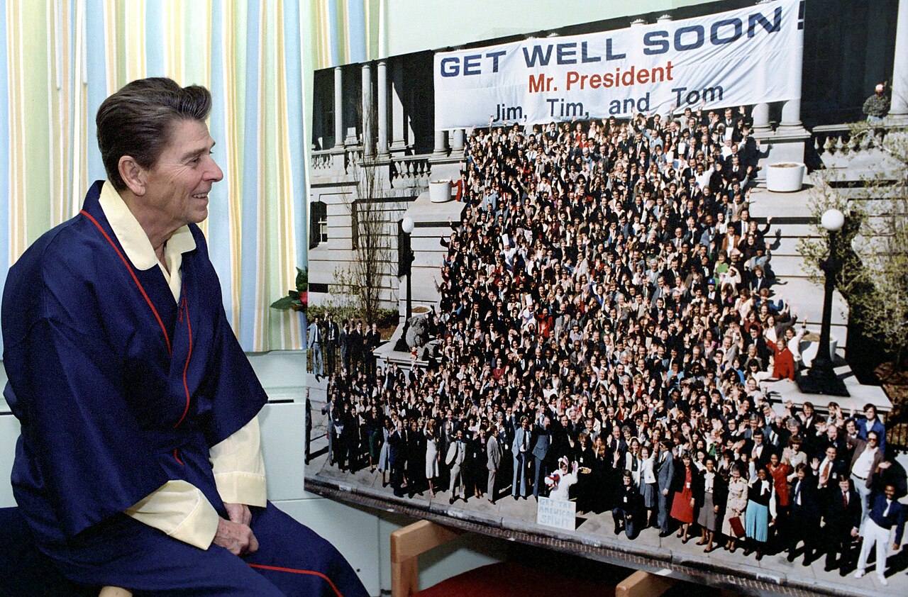 President Reagan Looking At  Get Well Soon Mr. President   photo