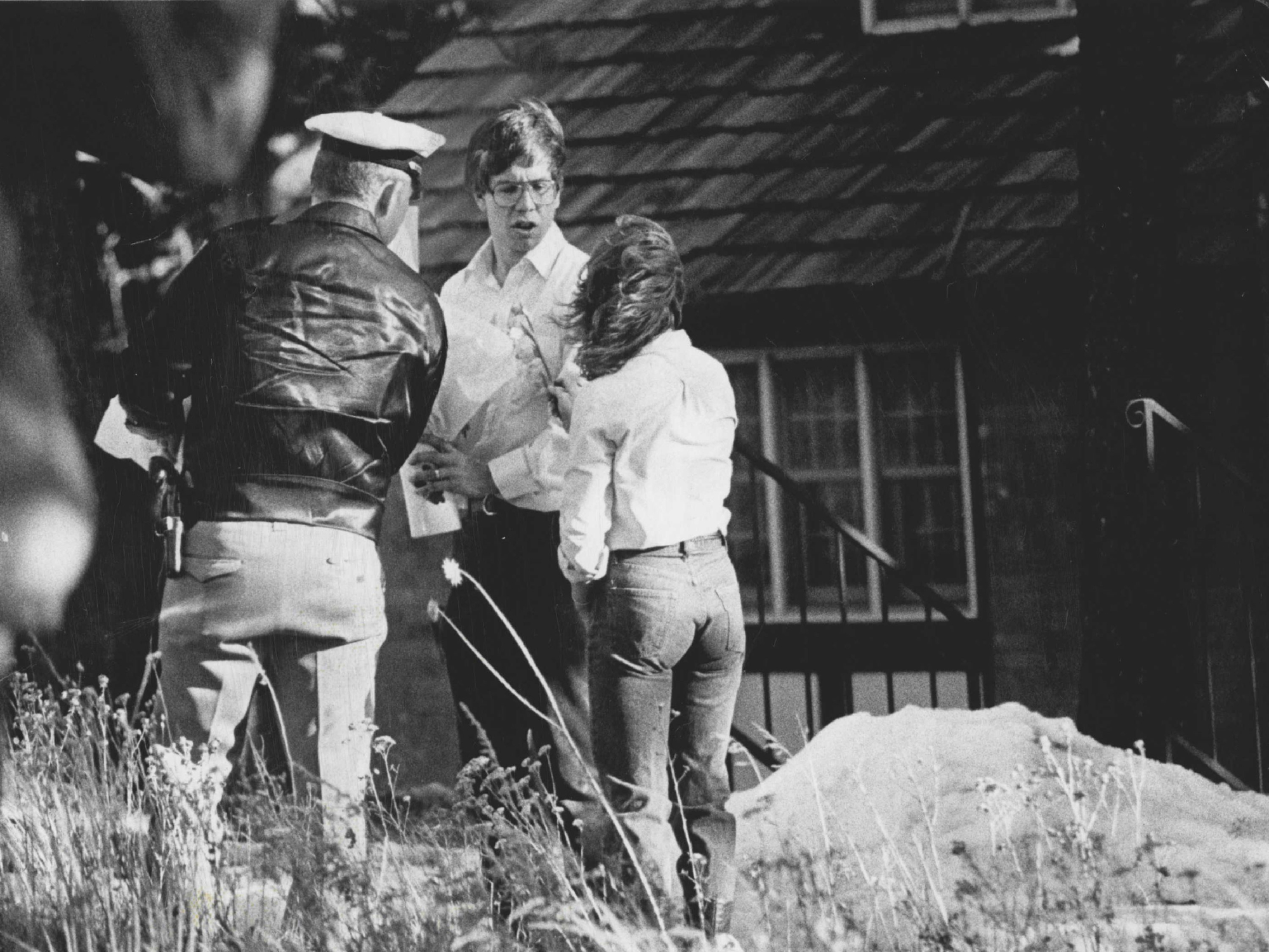 John W., Hinckley police officer and woman delivering flowers