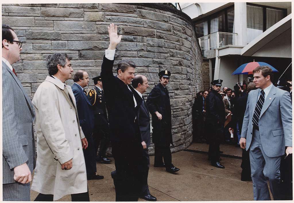 Photograph of President Reagan waving to crowds at Hilton Washington