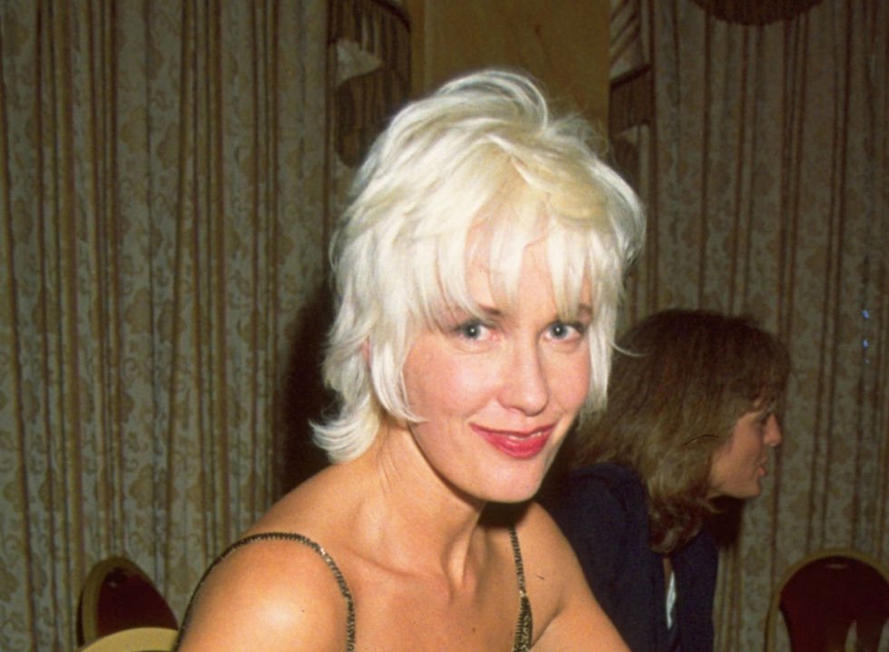 Paula Yates at the table
