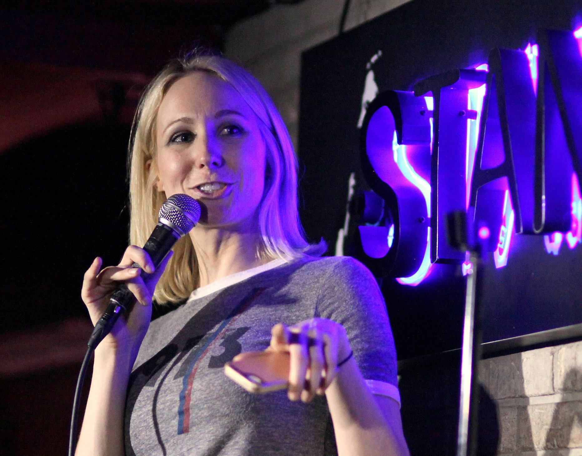 Nikki Glaser performing live on stage in August 2016.