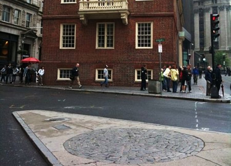 The stone circle in front of The Old State House is the location of the Boston Massacre