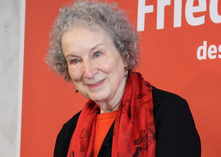 Margaret Atwood wearing red scarf