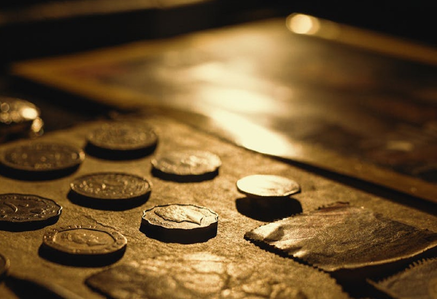 Old coins on table.