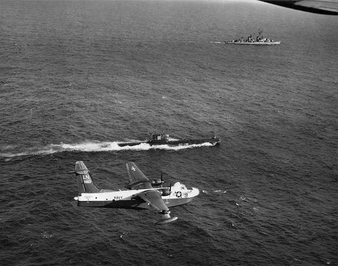 USS Charles P. Cecil (DD-835) and a Martin SP-5B Marlin