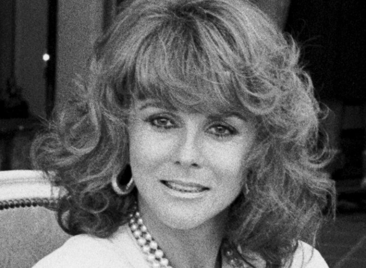 Ann-Margret wearing a white top