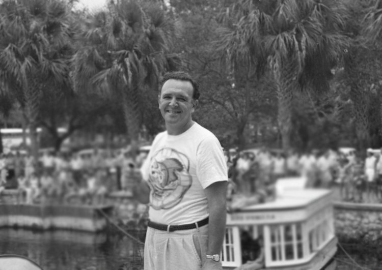 Director George Sidney wearing white t-shirt on boat