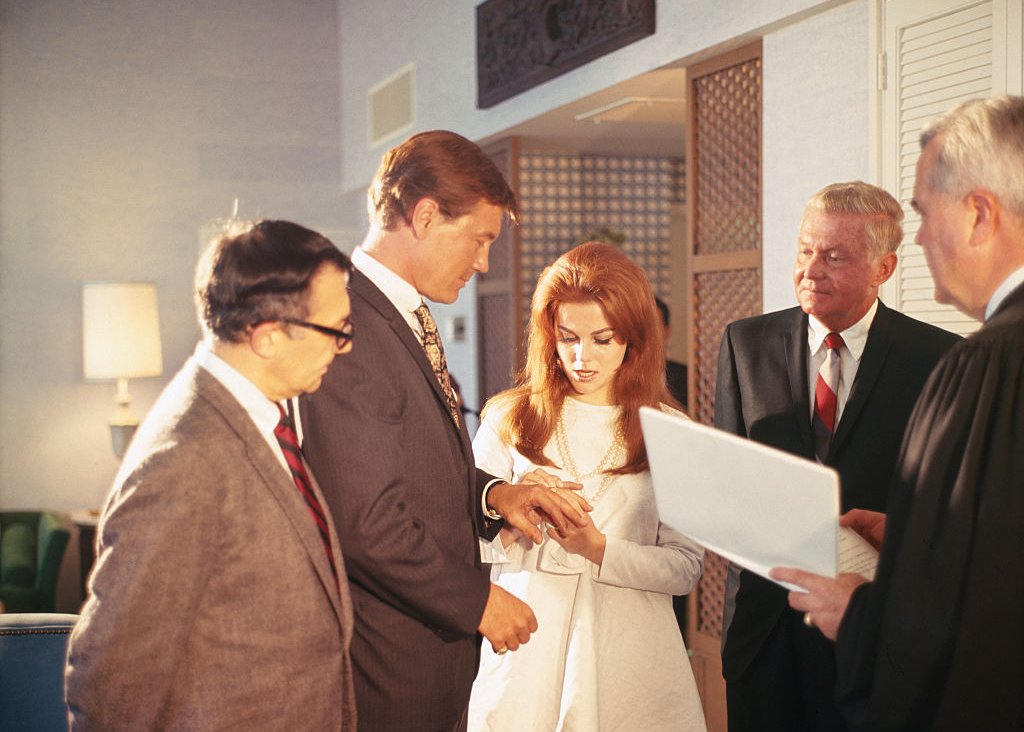 Ann-Margret, actress, with Roger Smith during wedding ceremony