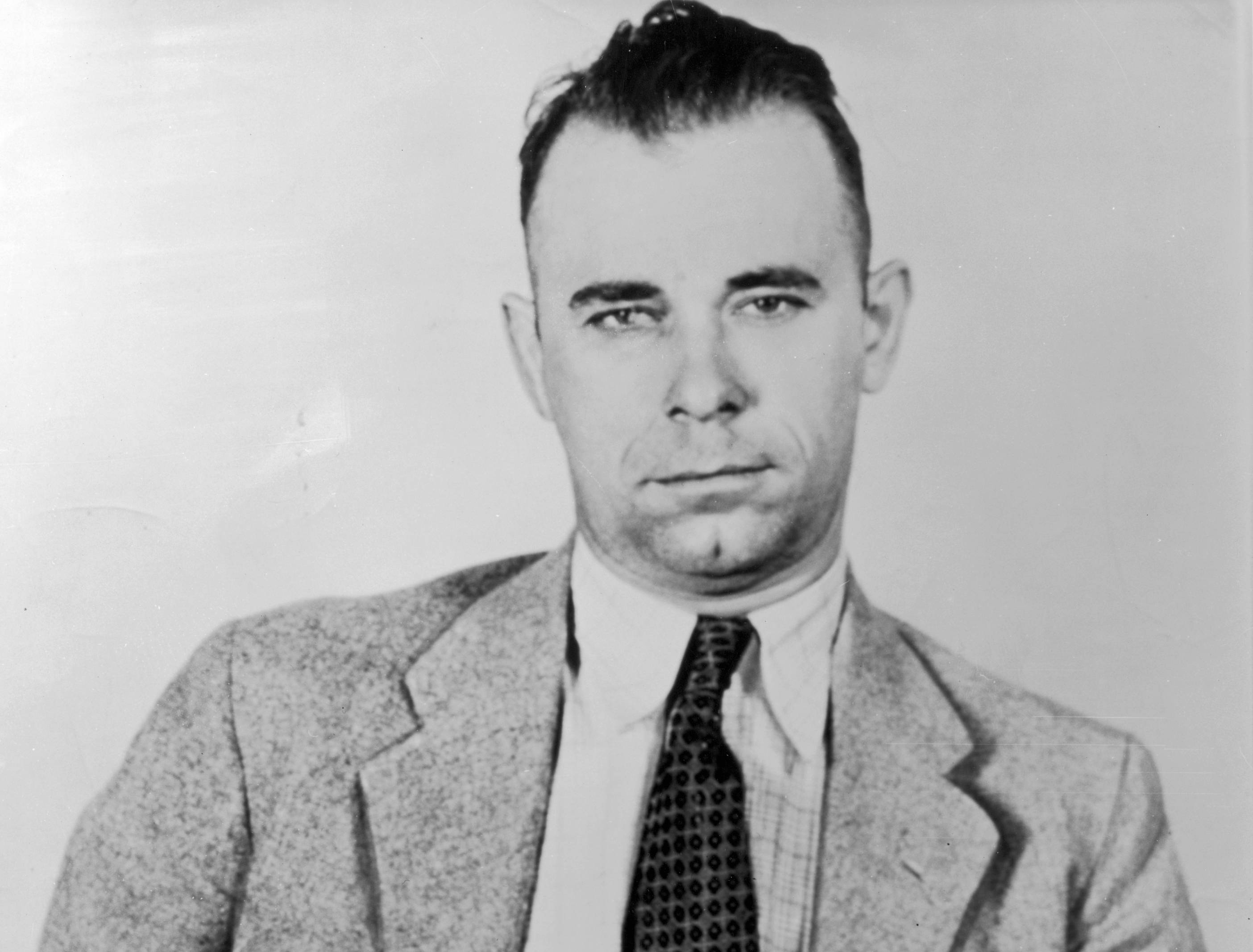 Portrait of John Dillinger wearing a jacket and tie