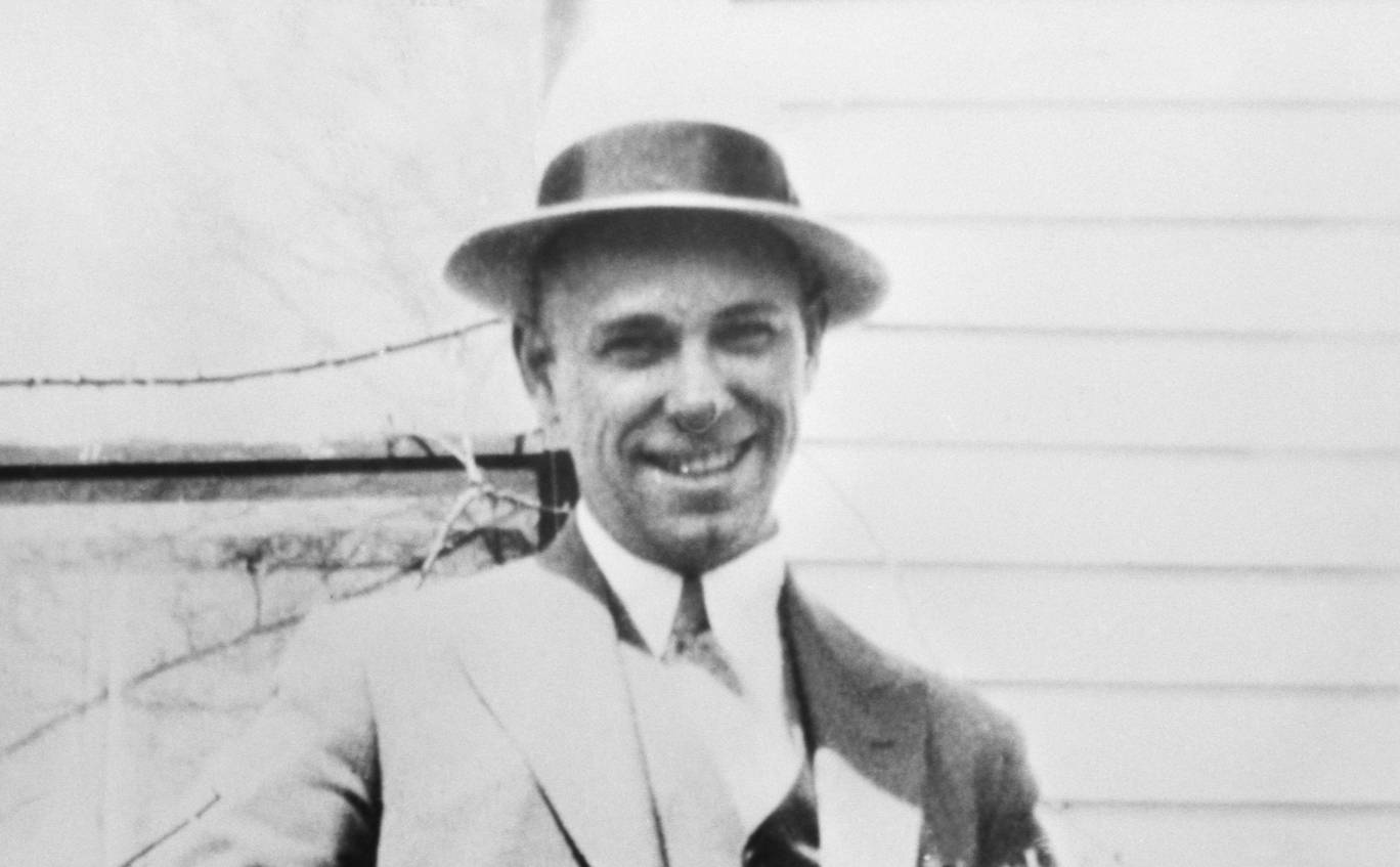 Photograph of John Dillinger in suit and a hat