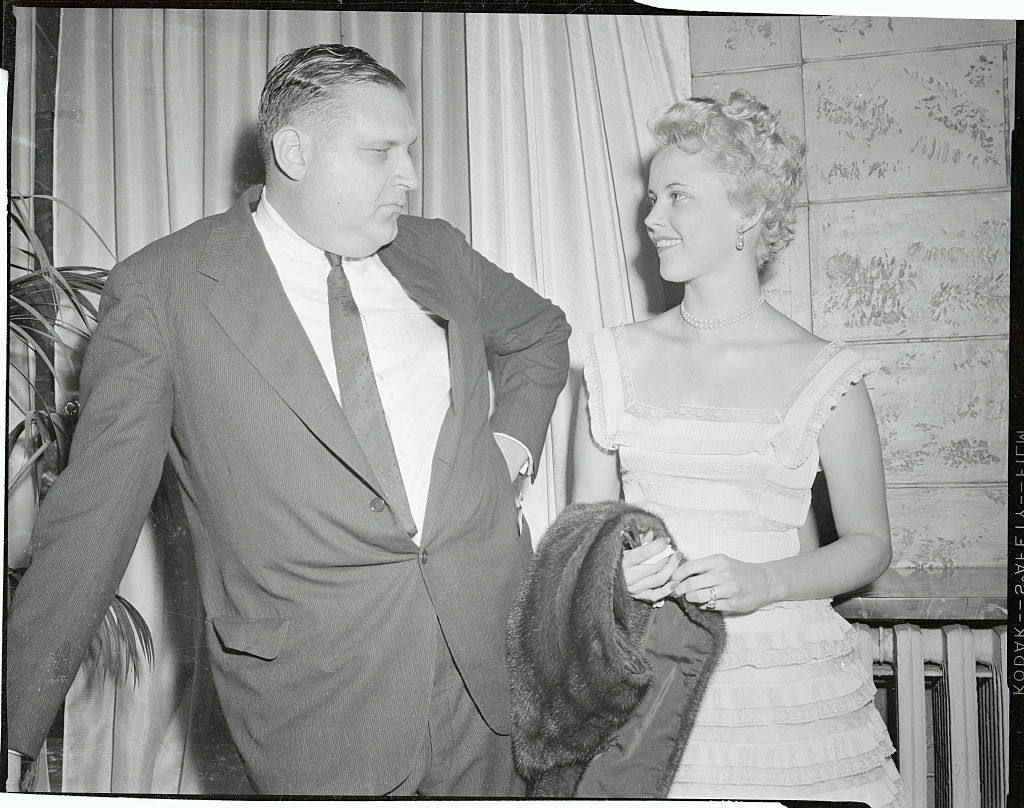 ohn J. Astor (left), 14-year-old wealthy New Yorker, is shown with his bride, Mrs. Delores Margaret Fullman (center), 26. T