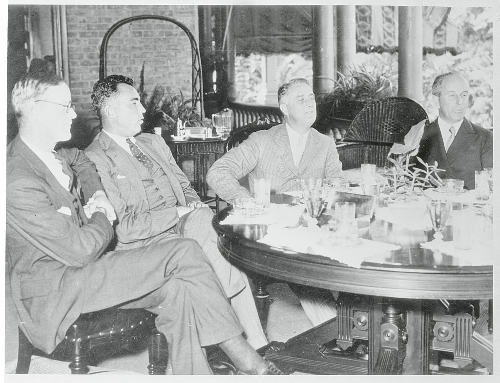 Albany, New York: Raskob And Roosevelt. Raskob And Astor As Luncheon Guest Of The Governor. L to R - George Roosevelt, Vincent Astor, society millionaire; Gov. Franklin D. Roosevelt and former Democratic national chairman, John J. Raskob at the Governor's luncheon at the executive mansion.