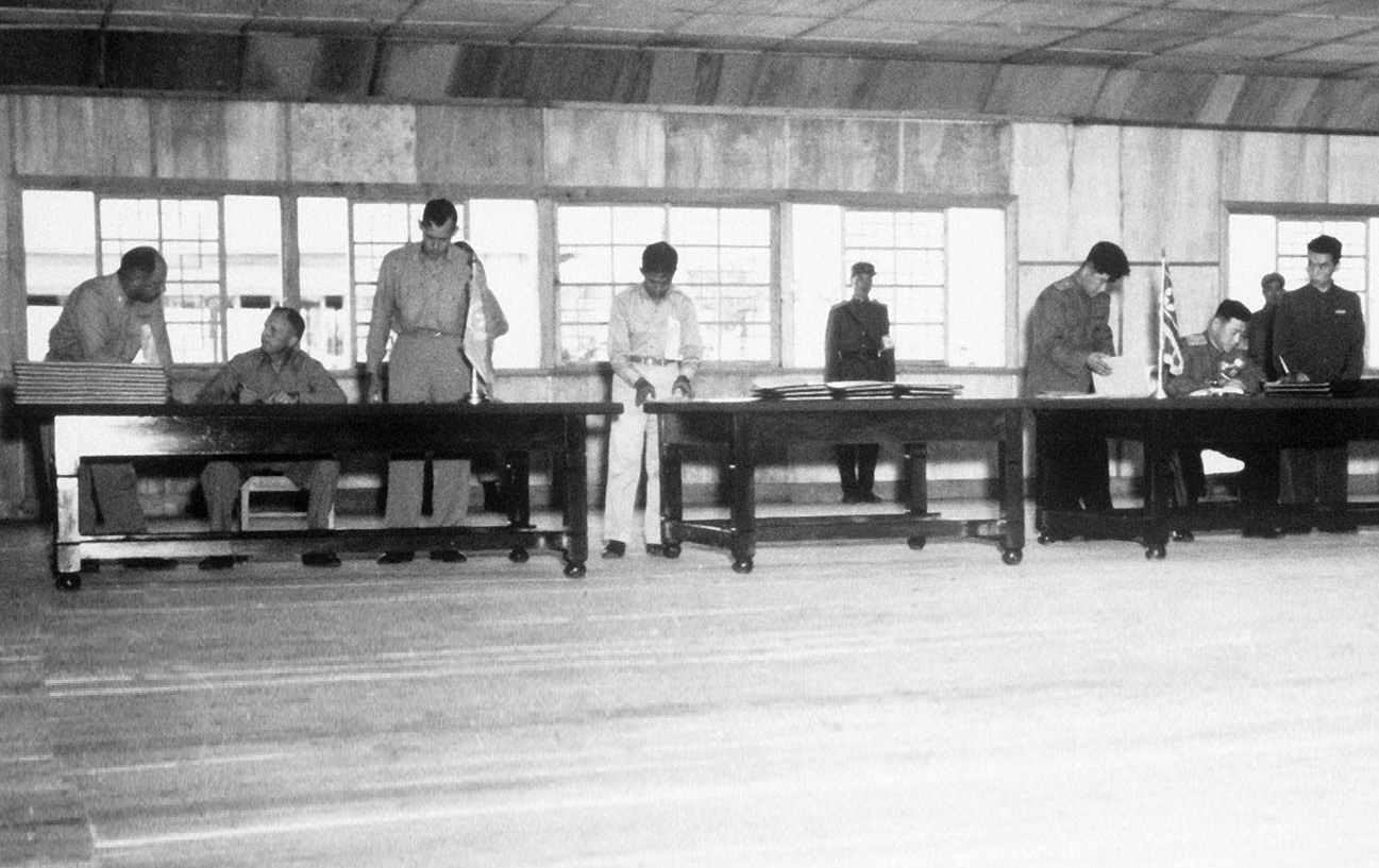 Signing the Korean War armistice agreement at P’anmunjŏm, Korea, July 27, 1953.