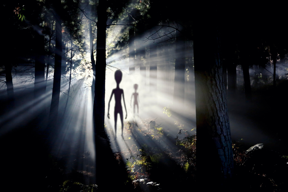 blurred alien figures