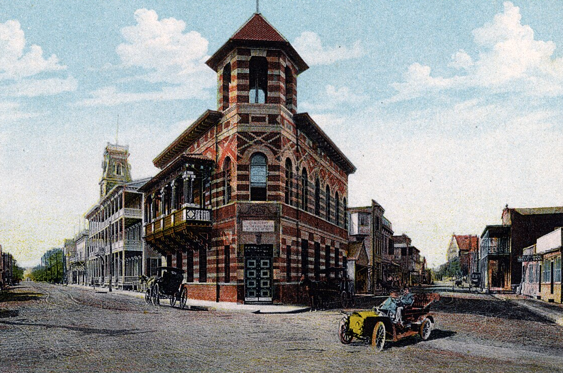 Postcard of corner of Duval and Front Streets