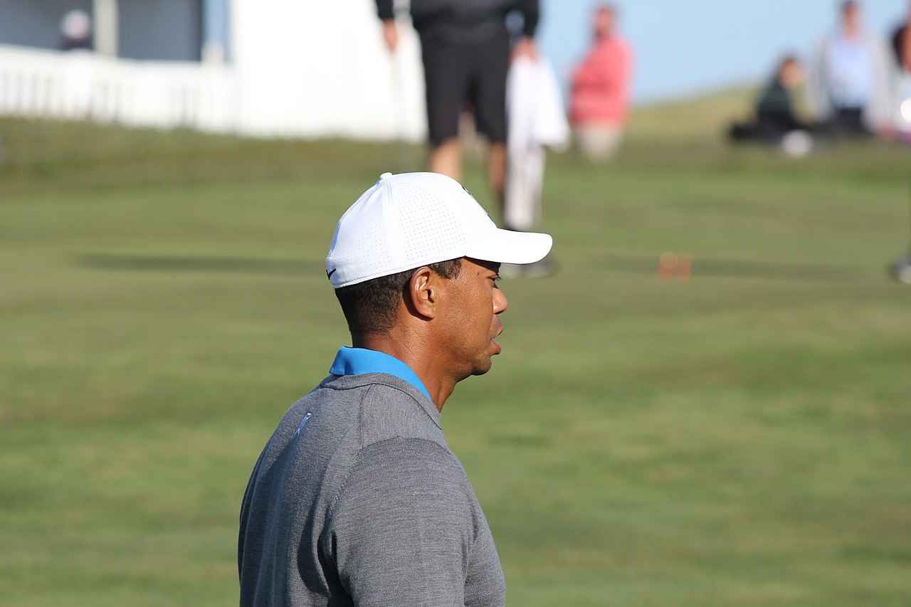 Tiger Woods wearing grey sweatshirt