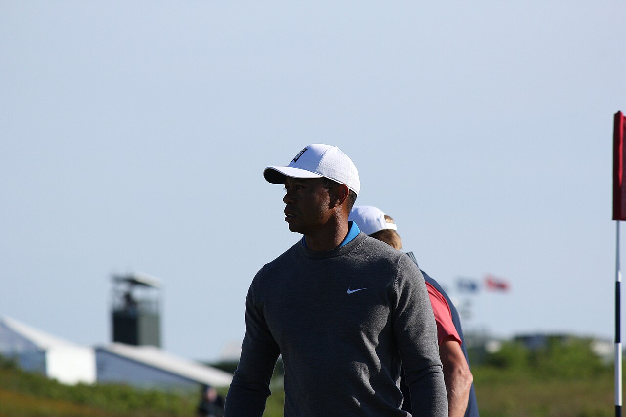 Tiger Woods wearing grey sweatshirt
