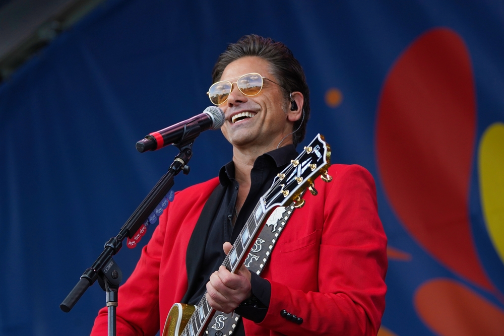 John Stamos performs at the 2024 New Orleans Jazz and Heritage Festival with The Beach Boys.