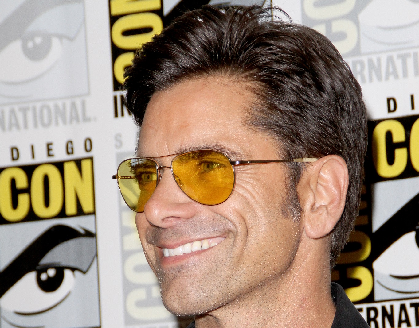 John Stamos arrives the 
