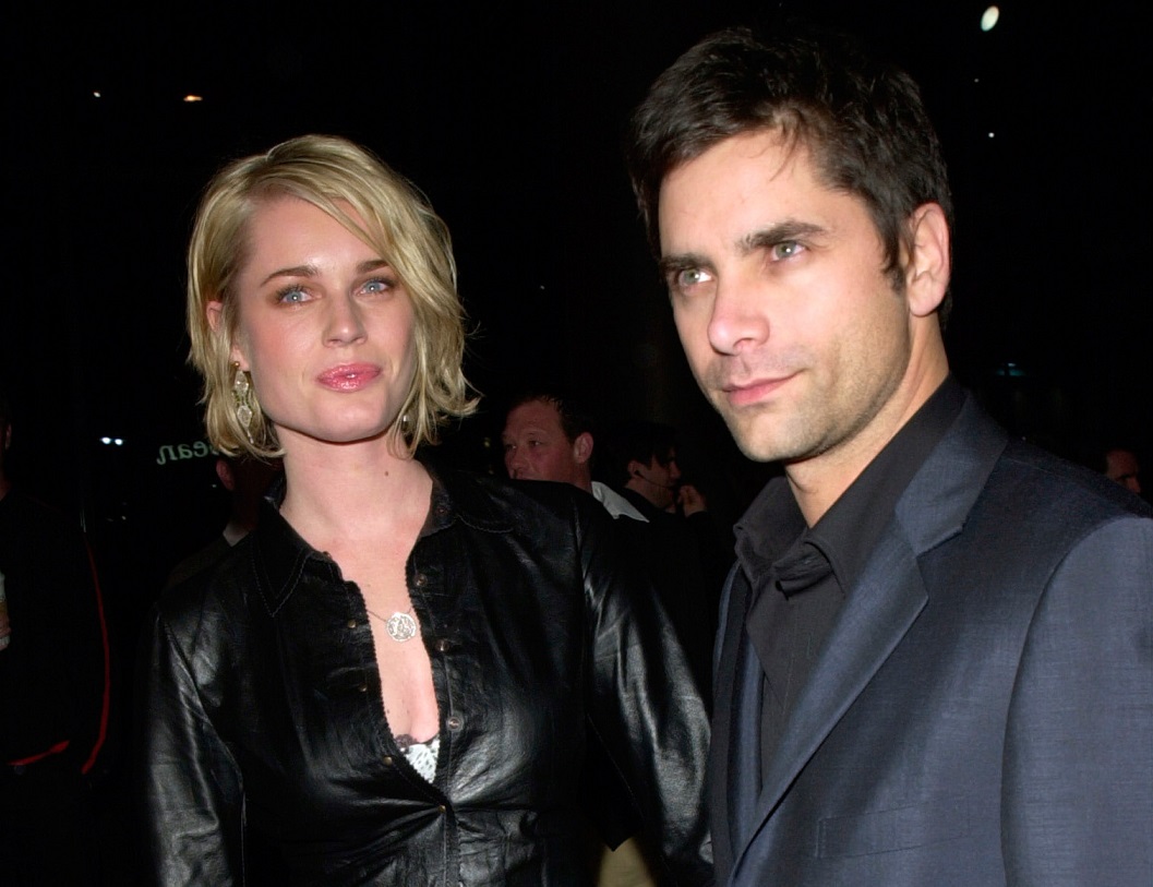 JOHN STAMOS & REBECCA ROMIJN STAMOS at the Los Angeles premiere of Snatch.