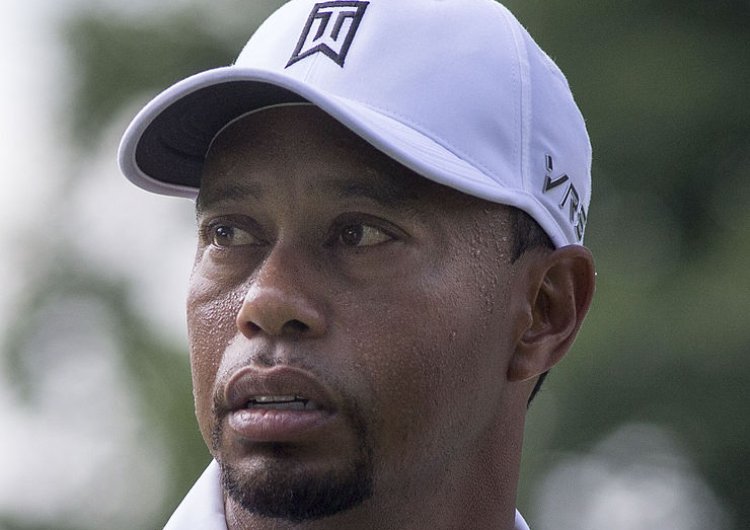 Tiger Woods wearing white cap