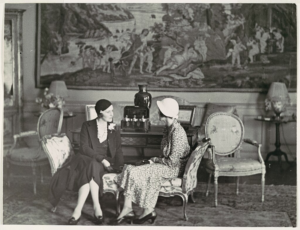 1024Px--Two Women, Seated And In Conversation, In Interior Setting- Met Dp102517