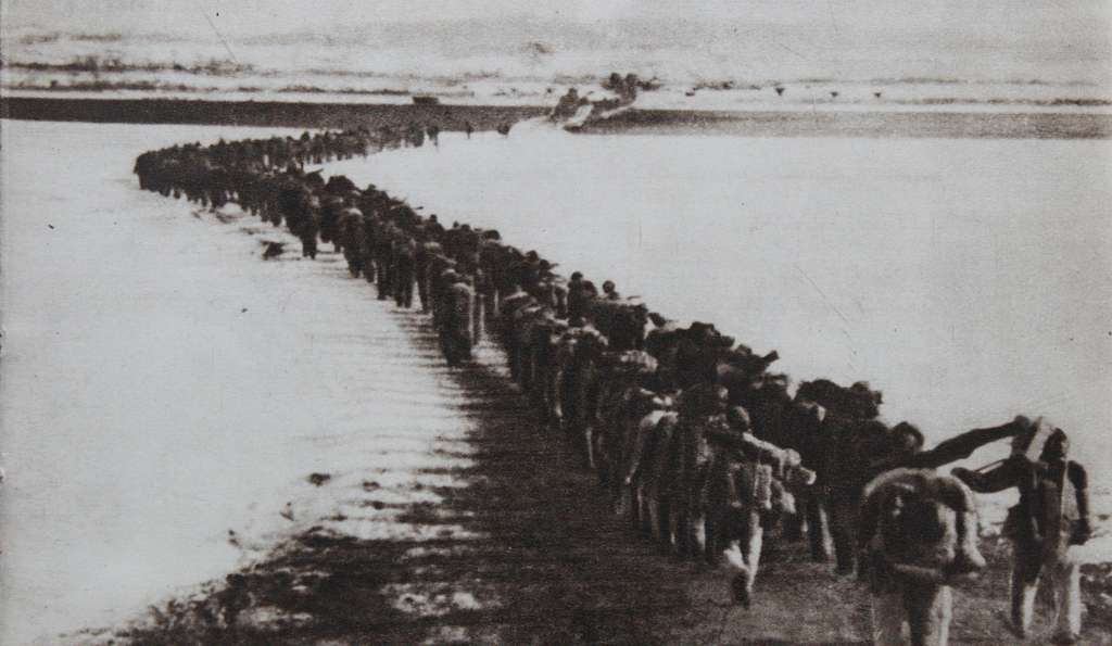 Chinese Volunteer Army troops crossing the Amrokgang River