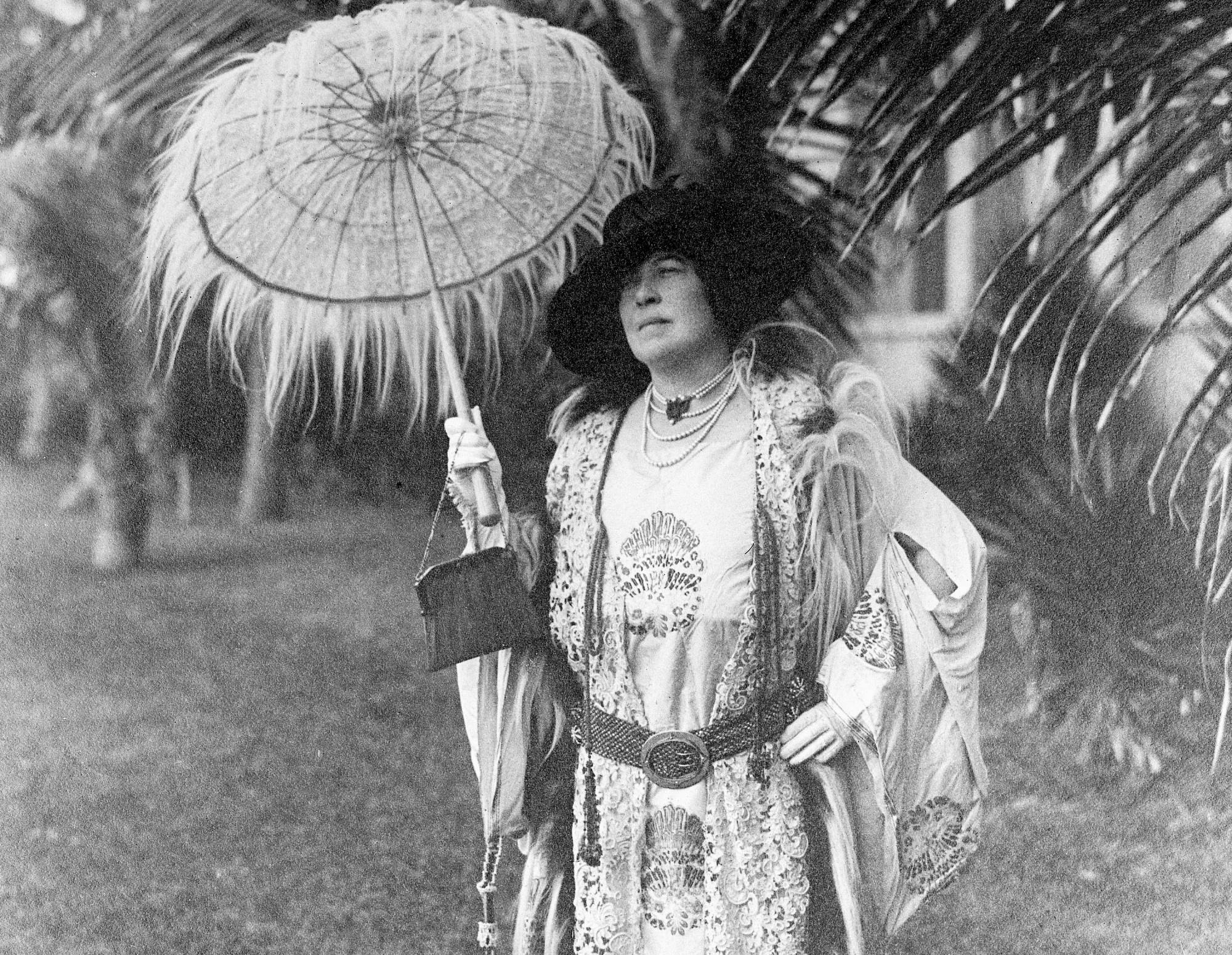 Millionaire Molly Brown holding a parasol