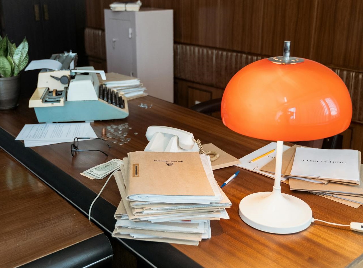 Stacked of Files on a Empty Desk.