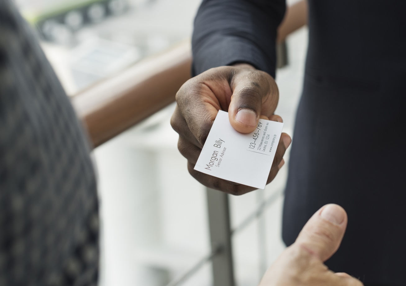 Business Discussion and giving a business card.