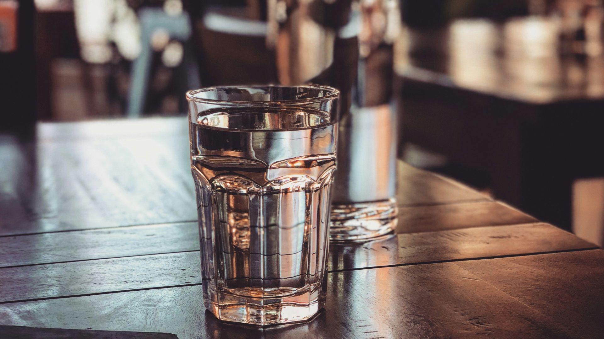 clear drinking glass on table