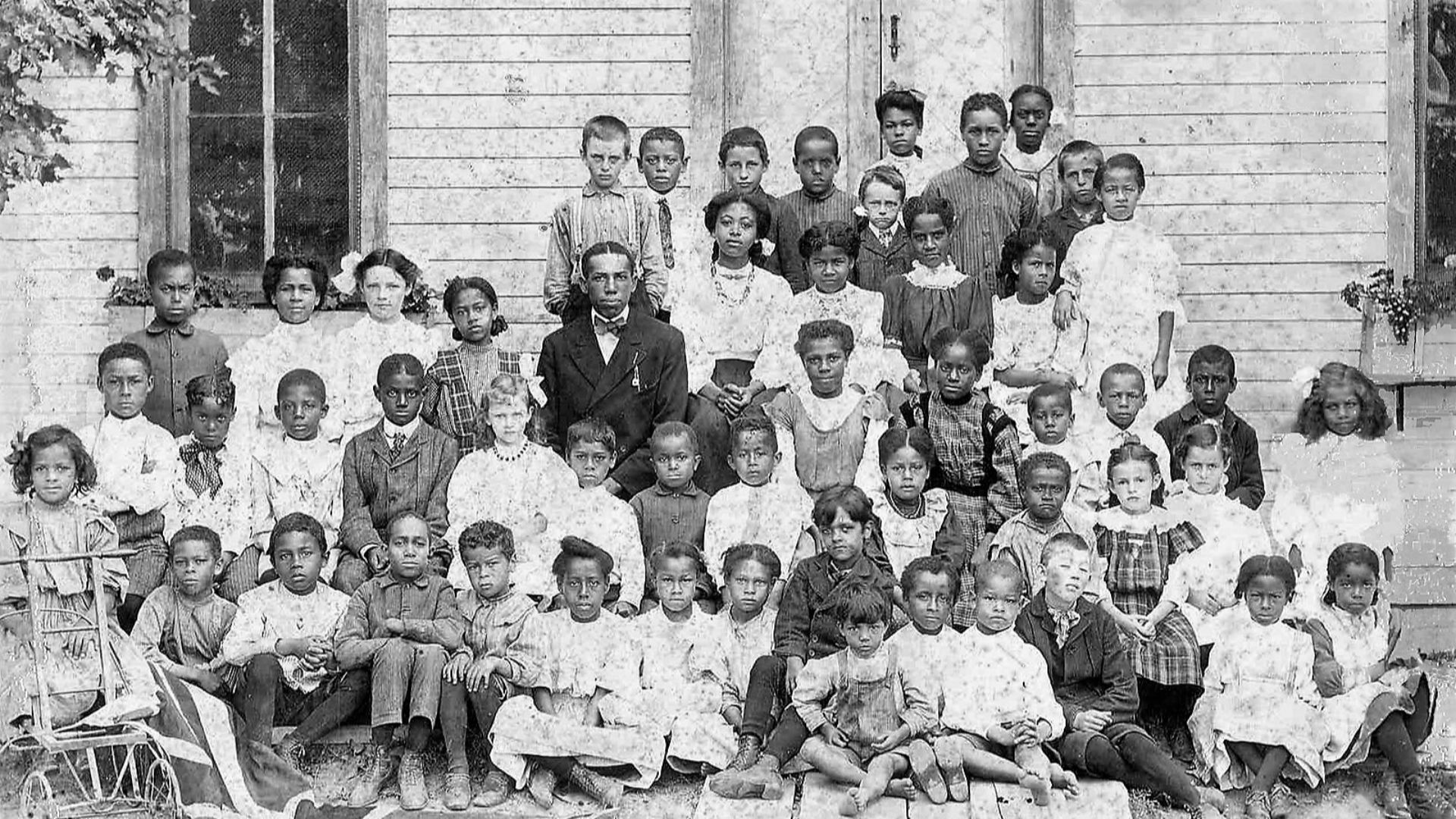 File:Class of 1909-1910 - in front of the only school in Canada built by fugitive slaves.jpg