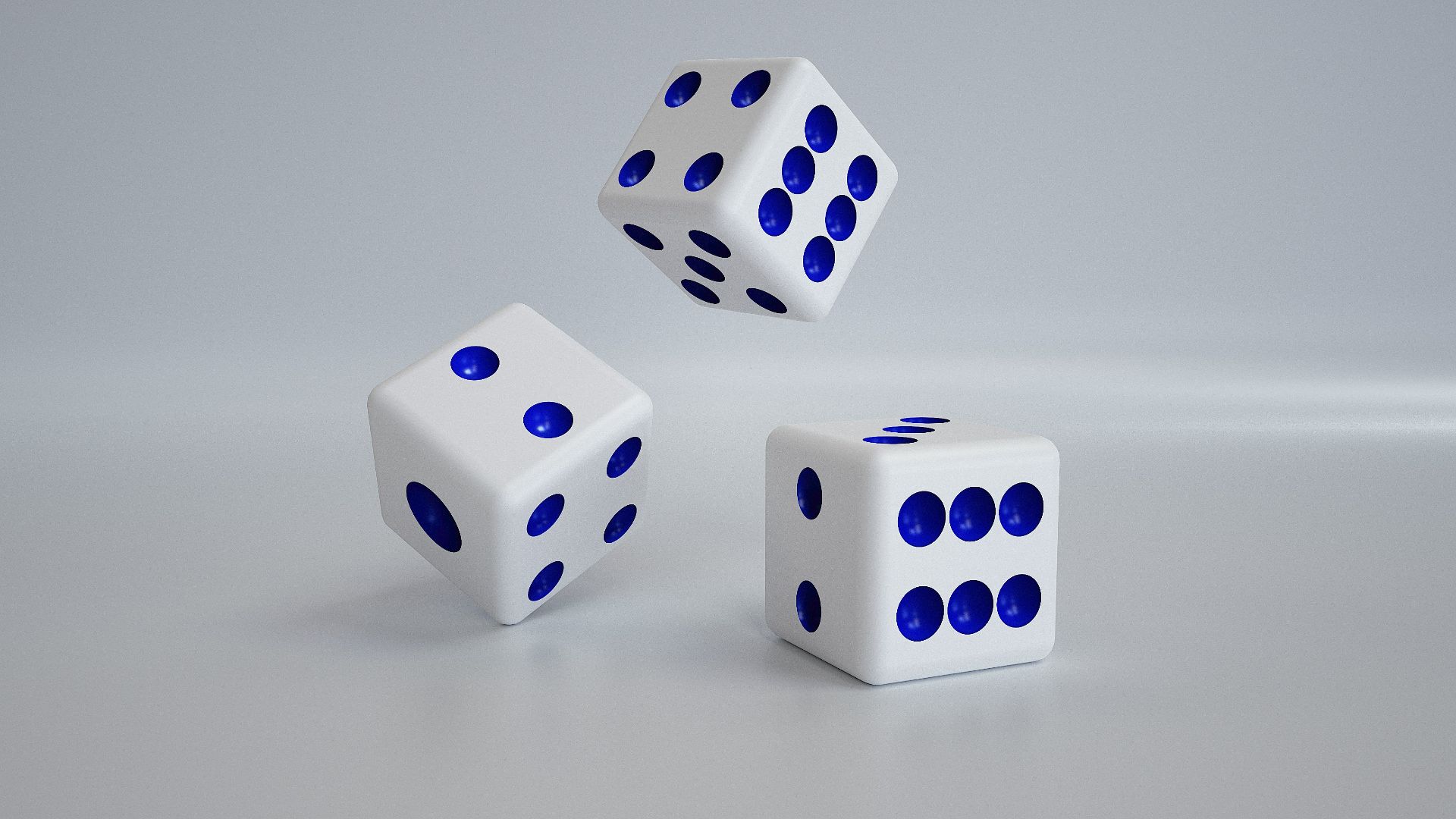 three white dices with blue dots on them